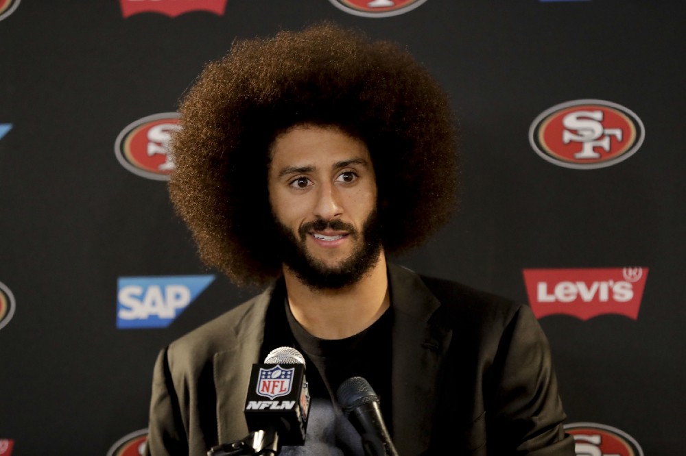 ‘San Francisco 49ers quarterback Colin Kaepernick talks during a news conference after an NFL football game against the Los Angeles Rams Saturday, Dec. 24, 2016, in Los Angeles. The San Francisco 49ers won 22–21. CREDIT: AP Photo/Rick Scuteri
