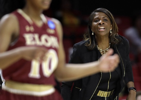 Elon head coach Charlotte Smith directs her players in the women’s NCAA college basketball tournament in College Park, Md., Friday, March 17, 2017. CREDIT: AP Photo/Patrick Semansky