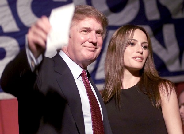 Melania with her future husband in 1999, when he was openly considering running for president as a nominee for the Reform Party. CREDIT: AP Photo/Tony Gutierrez