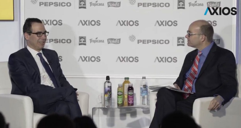 Steve Mnuchin (left) tells Axios’ Mike Allen about Trump’s “perfect genes.” CREDIT: Axios screengrab