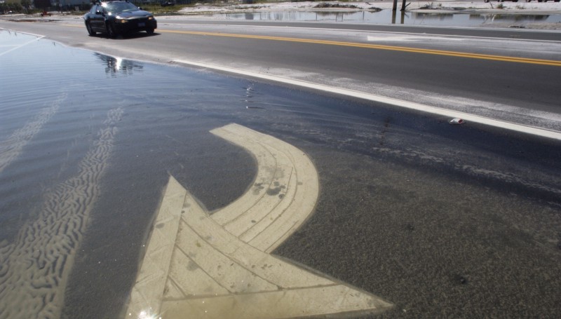 A Florida road flooded by tropical storm Arlene in 2005. Florida is especially susceptible to rising seas. Source: FEMA