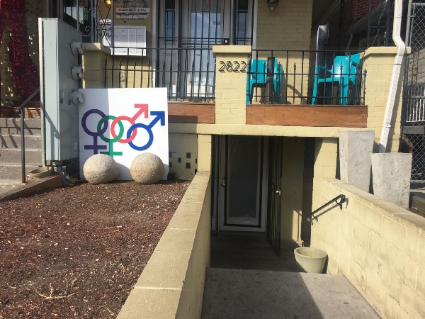 A plastic tarp covers the front door, and the outside of Casa Ruby. CREDIT: Kira Lerner