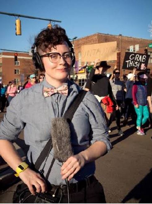 Helbert on a different reporting assignment with her mic in tow. CREDIT: Jacqui Helbert