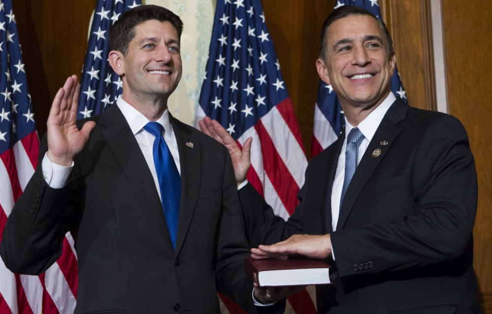 House Speaker Paul Ryan (R-WI) and Rep. Darrell Issa (R-CA) during a mock swearing in ceremony on Capitol Hill, January 3, 2017. AP Photo/Jose Luis Magana.