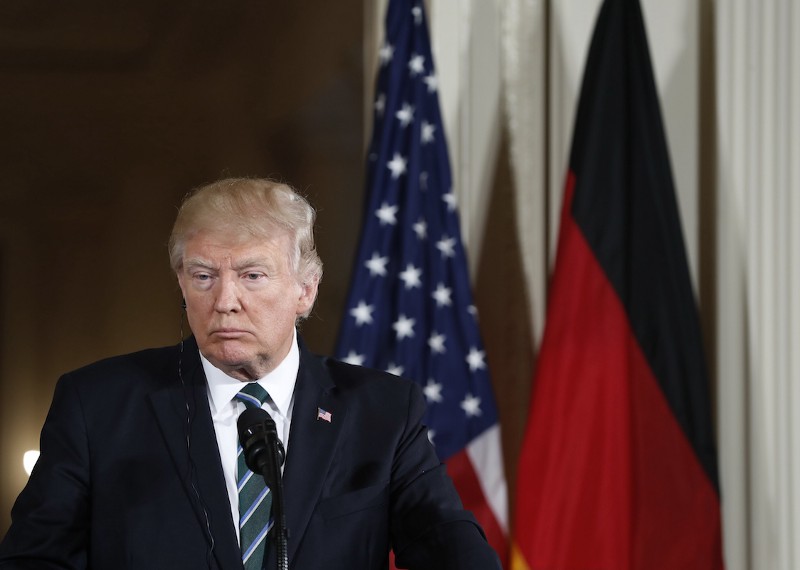 President Donald Trump listens to a question during a joint news conference with German Chancellor Angela Merkel in the East Room of the White House in Washington, Friday, March 17, 2017. CREDIT: AP/Pablo Martinez Monsivais