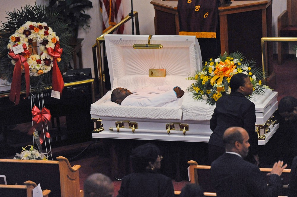 Eric Garner’s body lies in a casket during his funeral. CREDIT: AP Photo/New York Daily News, Julia Xanthos