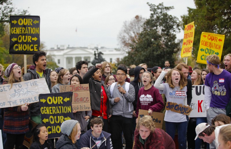 Youth rally for justice on climate, race, and immigration issues, November 2015. CREDIT: AP Photo/Pablo Martinez Monsivais