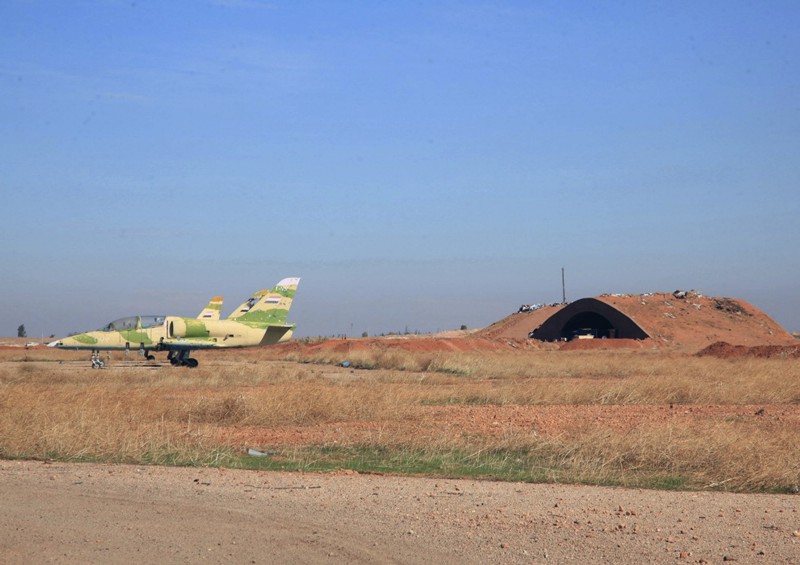 This file photo released by the Syrian official news agency SANA shows warplanes inside the Kweiras air base, east of Aleppo, Syria. CREDIT: SANA via AP Photos, File