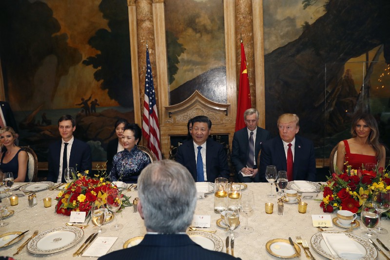 Ivanka Trump (far left) and Jared Kushner (second to left) sit next to Chinese first lady Peng Liyuan and Chinese President Xi Jinping (center) at a dinner at Mar-a-Lago, Thursday, April 6, 2017, in Palm Beach, Fla. CREDIT: AP Photo/Alex Brandon