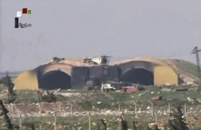 This frame grab from video provided by the Syrian official TV shows the burned and damaged hangar warplanes which attacked by U.S. Tomahawk missiles, at the Shayrat Syrian government forces airbase, southeast of Homs, Syria, early on April 7. CREDIT: Syrian government TV, via AP