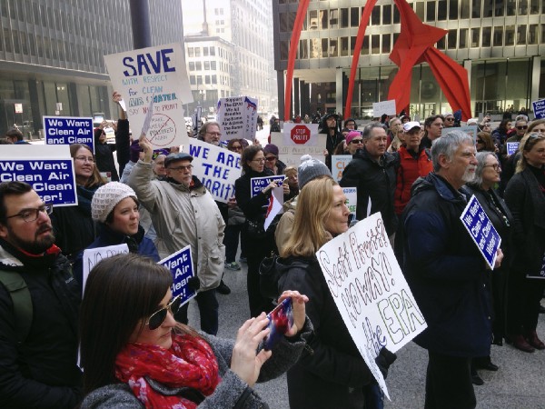 EPA employees and environmental activists gather in Chicago on Feb. 6, 2017, to protest Scott Pruitt’s nomination as EPA administrator. CREDIT: AP Photo/Carla K. Johnson