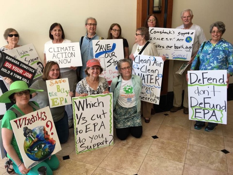 Residents gather at Rep. Barbara Comstock’s (R-VA) district officer in Sterling, Va., on April 11, 2017, to urge lawmaker to push back against President Donald Trump’s anti-environment agenda. CREDIT: Indivisible VA District 10