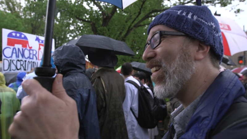 Patrick Madden, a computer science professor who is going to run for Congress in New York, joined the March for Science in Washington, D.C. CREDIT: Victoria Fleischer/ThinkProgress.