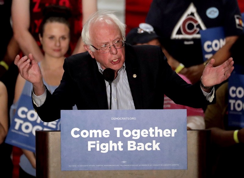 U.S. Sen. Bernie Sanders, I-Vt, speaks at a Democratic National Committee rally, Friday, April 21, 2017, in Mesa, Ariz. CREDIT: AP/Matt York
