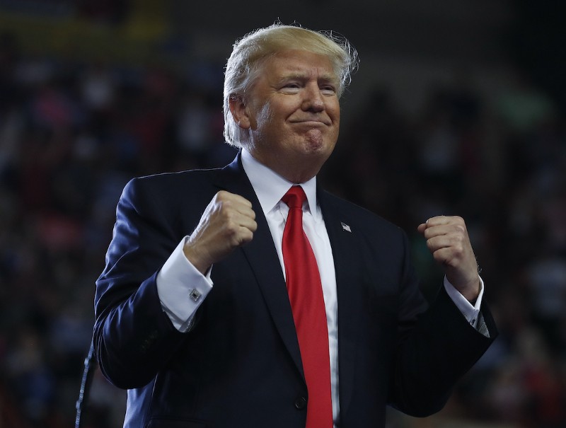 President Donald Trump turns to the audience behind him as he finishes speaking at the Pennsylvania Farm Show Complex and Expo Center in Harrisburg, Pa., Saturday, April, 29, 2017. CREDIT: AP/Carolyn Kaster