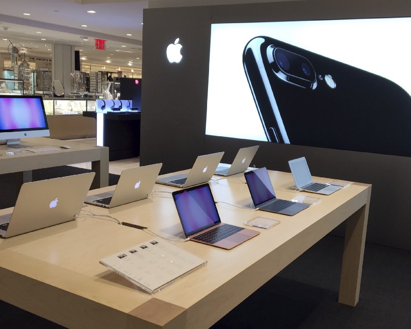 Apple products appear on display at Macy’s flagship store in New York. CREDIT: AP Photo/Anne D’Innocenzio
