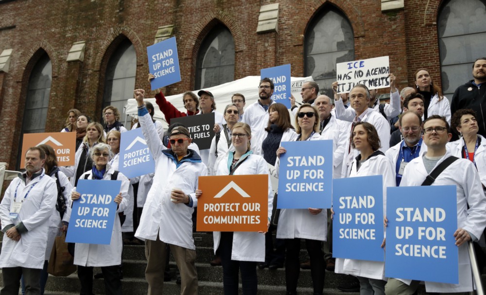 Scientists rally during the American Geophysical Union’s meeting In San Francisco on December 13, 2016. CREDIT: AP/Marcio Jose Sanchez