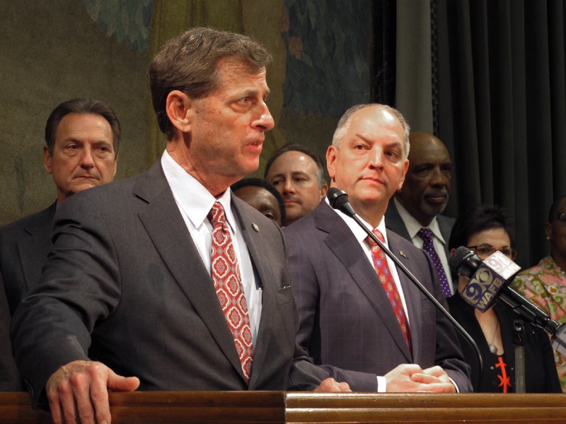 Gov. John Bel Edwards, right, listens as Corrections Secretary Jimmy LeBlanc talks about efforts to overhaul Louisiana’s criminal justice system. CREDIT: AP Photo/Melinda Deslatte