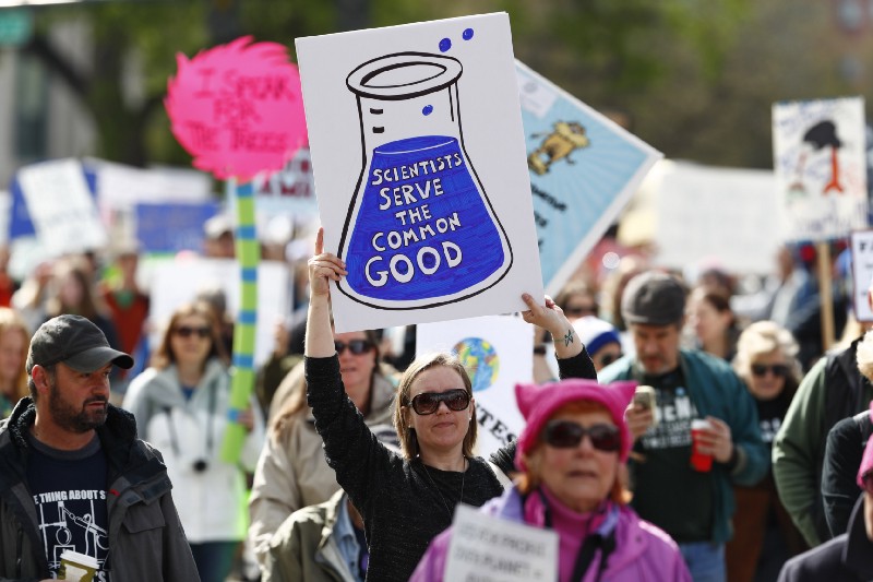 Environmental and women’s groups are using marches to get more people interested in running for office. In this photo, marchers carry signs during a march for science in Denver on April 22, 2017. CREDIT: AP Photo/David Zalubowski