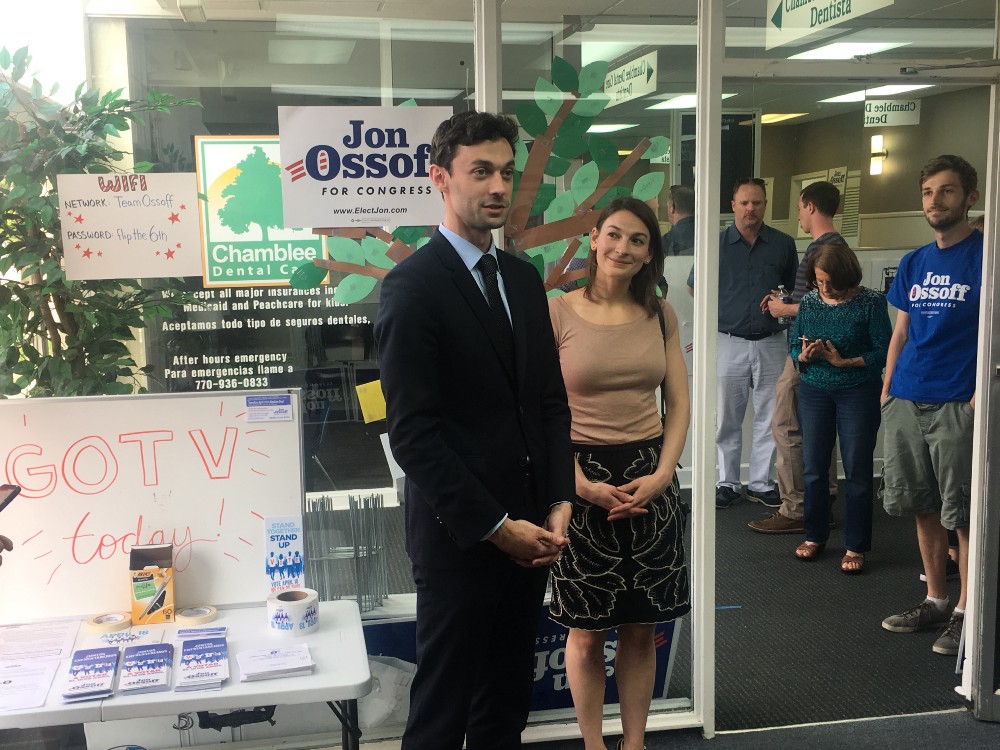 Jon Ossoff and his girlfriend stop by the Chamblee field office on Saturday, three days before the election. CREDIT: Kira Lerner