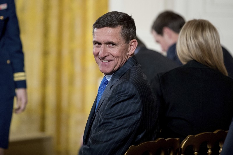 National Security Adviser Michael Flynn arrives for a White House senior staff swearing in ceremony in the East Room of the White House, Sunday, Jan. 22, 2017, in Washington. CREDIT: AP Photo/Andrew Harnik
