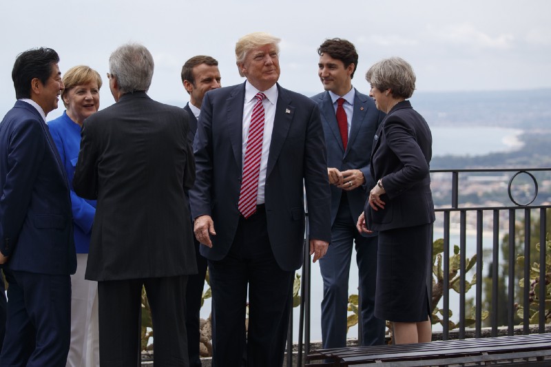 President Donald Trump takes a walking tour with G7 leaders, Friday, May 26, 2017, in Taormina, Italy. CREDIT: AP Photo/Evan Vucci