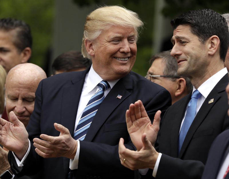 In this May 4, 2017, photo, President Donald Trump talks to House Speaker Paul Ryan of Wis. in the Rose Garden of the White House in Washington, after the House pushed through a health care bill. CREDIT: AP Photo/Evan Vucci