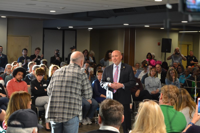 A constituent asks Tom MacArthur about his amendment that saved the Affordable Health Care Act. CREDIT: Kira Lerner