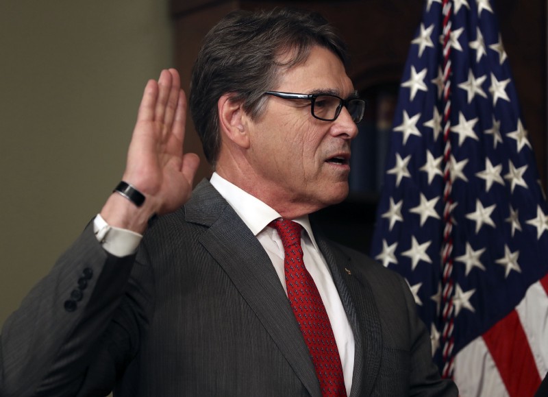 Senators accuse Rick Perry, shown here taking the oath of office on March 2, 2017, of ordering a grid reliability study to undermine the ongoing growth of renewable energy resources. CREDIT: AP Photo/Andrew Harnik
