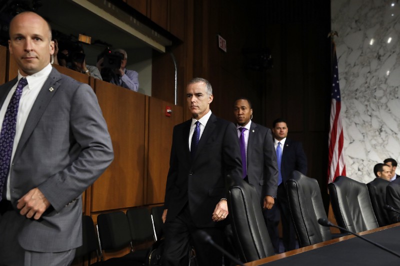 Acting FBI Director Andrew McCabe, second from left, arrives on Capitol Hill in Washington, Thursday, May 11, 2017, to testify before the Senate Intelligence Committee hearing on major threats facing the U.S. CREDIT: AP Photo/Jacquelyn Martin
