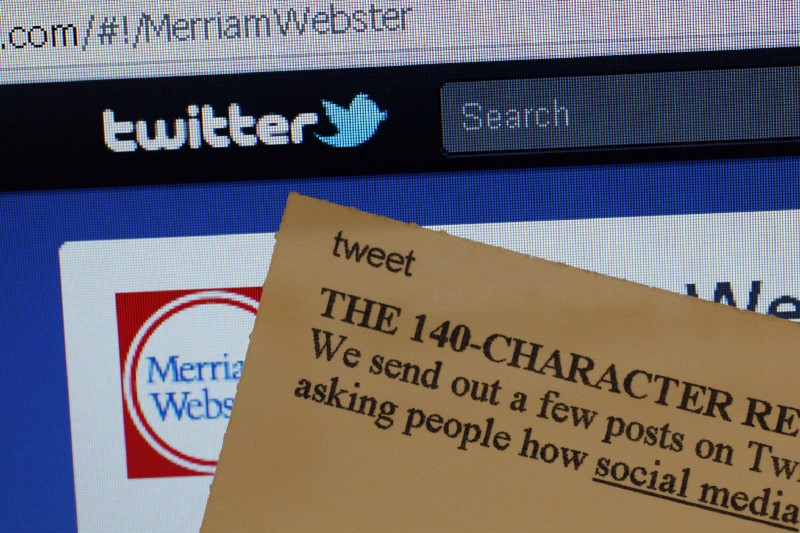 This Wednesday, Aug. 24, 2011 photo displays an index card with the entry “tweet” next to a computer screen showing the Twitter website, at the Merriam-Webster headquarters in Springfield, Mass. CREDIT: AP Photo/Charles Krupa