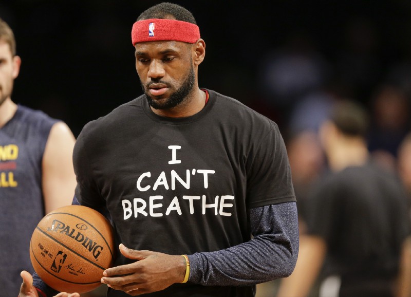 Cleveland Cavaliers’ LeBron James warms up before an NBA basketball game against the Brooklyn Nets at the Barclays Center, Dec. 8, 2014, in New York. Professional athletes have worn “I Can’t Breathe” messages in protest of a grand jury ruling not to indict an officer in the death of a New York man. CREDIT: AP Photo/Frank Franklin II