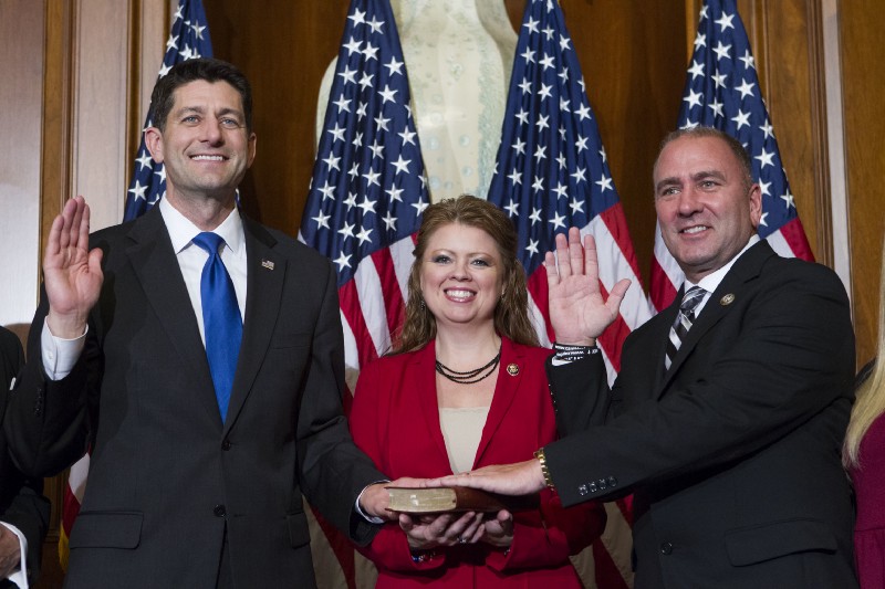 House Speaker Paul Ryan of Wis. administers the House oath of office to Rep. Clay Higgins, R-La., during a mock swearing in ceremony on Capitol Hill in Washington, Tuesday, Jan. 3, 2017, as the 115th Congress began. CREDIT: AP Photo/Jose Luis Magana