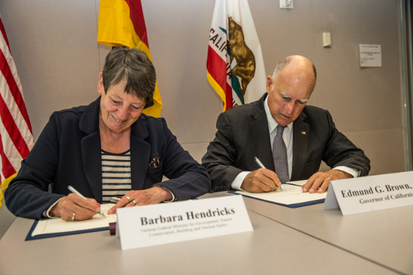 California Gov. Jerry Brown and German Environment Minister Barbara Hendricks sign joint statement on climate cooperation. CREDIT: John Larimore/State of California