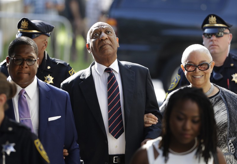 Bill Cosby arrives for his sexual assault trial with his wife Camille Cosby, right, at the Montgomery County Courthouse in Norristown, Pa., Monday, June 12, 2017. CREDIT: AP Photo/Matt Rourke