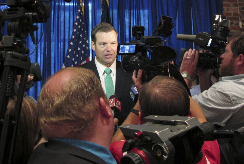 GKansas Secretary of State Kris Kobach answers questions from reporters. Kobach is vice chairman of President Donald Trump’s commission on election fraud and has advised Trump on immigration and voter fraud issues. CREDIT: AP Photo/John Hanna