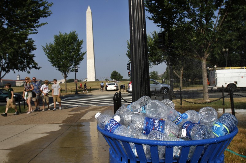 A recycling bin is full of discarded water bottles on the National Mall in Washington, on Wednesday, June 8, 2011. CREDIT: AP Photo/Jacquelyn Martin