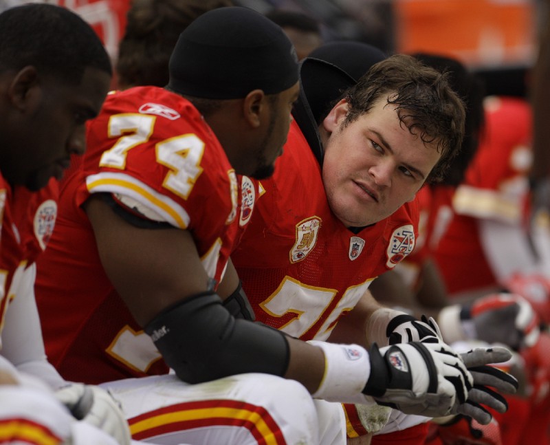 Kansas City Chiefs guard Ryan O’Callaghan, right, sits on the bench with teammates during the third quarter of an NFL football game against the Pittsburgh Steelers Sunday, Nov. 22, 2009 in Kansas City, Mo. The Chiefs won the game 27–24. CREDIT: AP Photo/Charlie Riedel