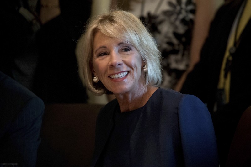 Education Secretary Betsy DeVos attends a Cabinet meeting with President Donald Trump, Monday, June 12, 2017, in the Cabinet Room of the White House in Washington. CREDIT: AP/Andrew Harnik