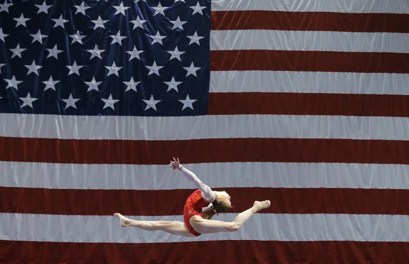 Madison Kocian competes on the balance beam during the U.S. women’s gymnastics championships, Friday, June 24, 2016, in St. Louis. CREDIT: AP Photo/Tony Gutierrez