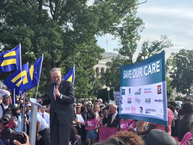 Chuck Schumer made a speech to protesters against the Republican health care bill at the U.S. Capitol on Wednesday. CREDIT: ThinkProgress/Amanda Gomez