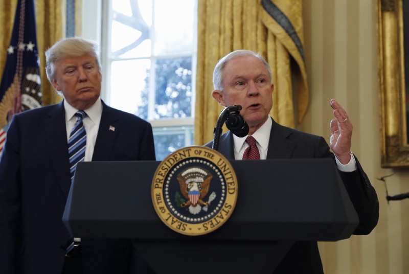 , President Donald Trump listens as Attorney General Jeff Sessions speaks in the Oval Office of the White House in Washington on Feb. 9, 2017. Credit: (AP Photo/Pablo Martinez Monsivais)