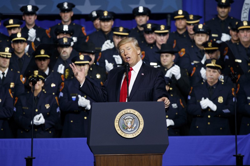 President Donald Trump speaks to law enforcement officials on the street gang MS-13, Friday, July 28, 2017, in Brentwood, N.Y. CREDIT: AP Photo/Evan Vucci