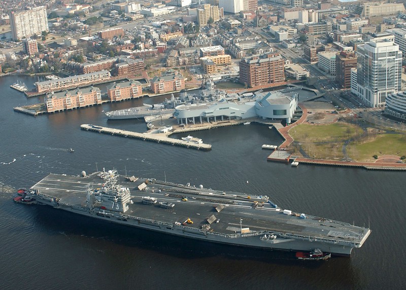 USS George Washington travels through downtown Norfolk, Virginia, after leaving the flood-prone Norfolk Naval Station. CREDIT: Mate 3rd Class Summer M. Anderson