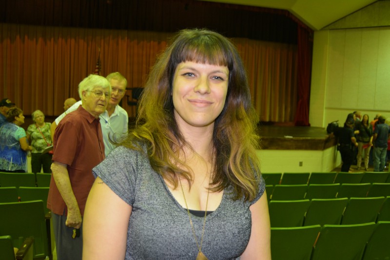 Dani Ausen asked Ernst how she could support a plan that would not cover essential health benefits. CREDIT: Kira Lerner