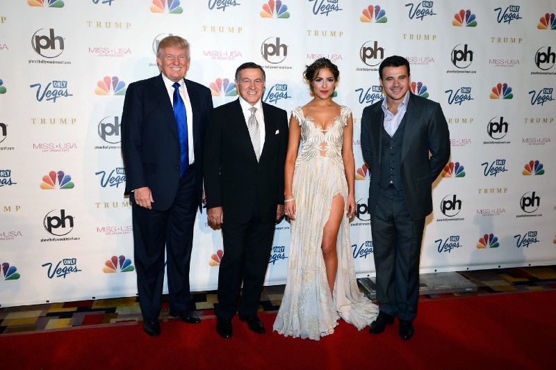 From left, Donald Trump, Aras Agalarov, Miss Universe 2012 Olivia Culpo and Russian singer Emin Agalarov arrive at the Miss USA 2013 pageant, Sunday, June 16, 2013, in Las Vegas. CREDIT: AP Photo/Jeff Bottari
