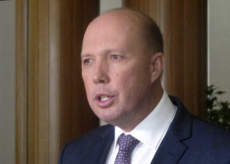 Australia’s Immigration and Border Protection Minister Peter Dutton speaks to reporters in Parliament House in Canberra, Australia, Wednesday, June 21, 2017. CREDIT: AP Photo/Rod McGuirk