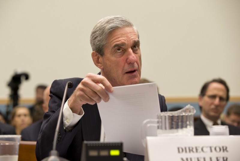 FBI Director Robert Mueller testifies on Capitol Hill in Washington, Thursday, June 13, 2013, as the House Judiciary Committee held an oversight hearing on the FBI. Mueller is nearing the end of his 12 years as head of the law enforcement agency that is conducting high-profile investigations of the Boston Marathon bombings, the attacks in Benghazi, Libya, and leaks of classified government information. The committee’s chairman, Rep. Bob Goodlatte, R-Va., said when it comes to national security leaks, it’s important to balance the need to protect secrecy with the need to let the news media do their job. CREDIT: AP Photo/J. Scott Applewhite