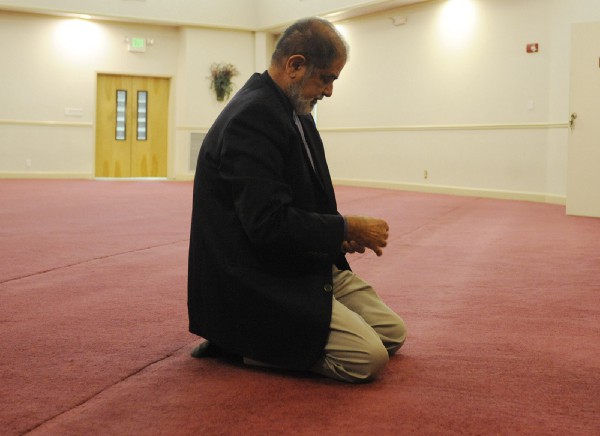 Ashfaq Taufique, president of the Birmingham Islamic Society kneels in prayer at the group’s mosque in Hoover, Ala. Following the election of Donald Trump, Taufique said some members are worried because of his campaign rhetoric concerning Muslims. CREDIT: AP Photo/Jay Reeves