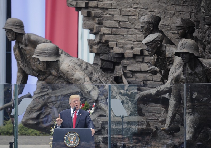 U.S. President Donald Trump delivers a speech in Krasinski Square, back dropped by the monument commemorating the 1944 Warsaw Uprising against the Nazis, in Warsaw, Poland, Thursday, July 6, 2017. CREDIT: AP Photo/Alik Keplicz